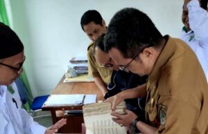 Dinas Kearsipan dan Perpustakaan Barito Utara Terima Al Quran Tulisan Tangan Karya Ulama Lokal