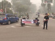 PWI Barito Utara Bagikan Ribuan Masker Untuk Warga Terdampak Kabut Asap